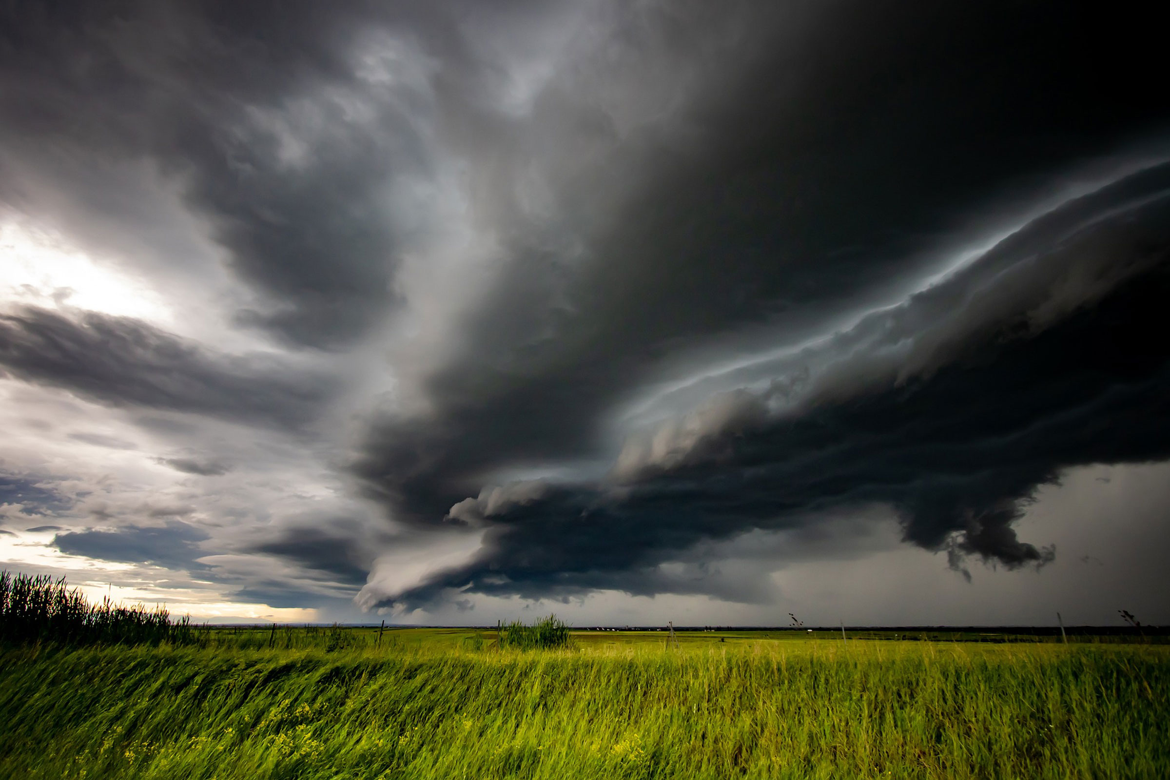 Storm clouds above field